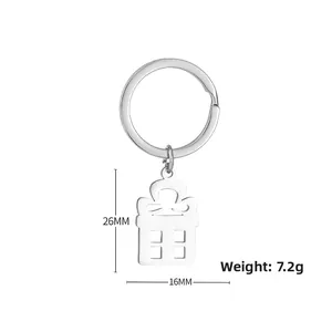 Detailed view of polished stainless steel Christmas gift box keychain with size metrics