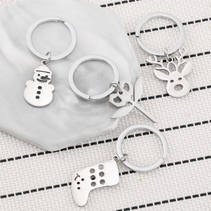 Christmas stainless steel keychains set with snowman and reindeer charms for backpacks