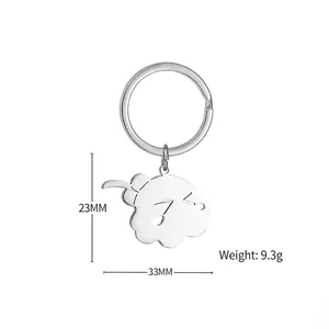 Cute cloud-shaped stainless steel keychain with emoji face and sprout detail, 33mm width