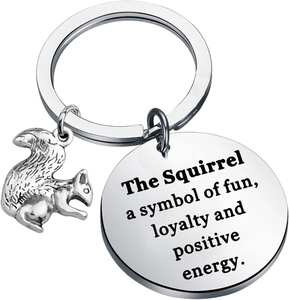 Detailed close-up of a silver squirrel charm and engraved disc on stainless steel keychain