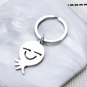 Porte-clés poulpe en acier inoxydable poli avec un pendentif de dessin animé épuré