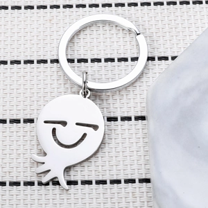 Porte-clés poulpe minimaliste en acier inoxydable argenté avec design ajouré chic