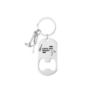 Macro shot of bottle opener keychain with Love You Daddy engraving and tool charms