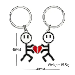 Matching magnetic stick figure couple keychains with red heart for Valentines gift