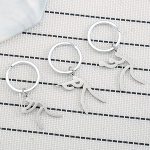 Three-piece stainless steel sports matchstick man keychains with athletic poses