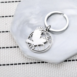 Polished stainless steel Haikyuu Karasuno keychain with flying crow design and grid