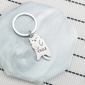 Portachiavi gatto pigro minimalista in acciaio inossidabile argento su base in marmo