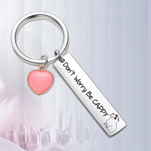 Stainless steel capybara keychain with pink glitter heart and engraved positive quote