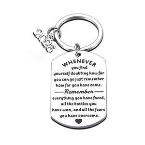 Inspirational stainless steel graduation keychain with 2026 tag and engraved courage quote