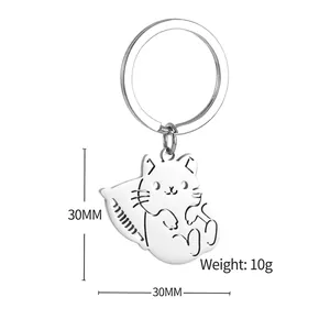 Porte-clés chat mignon en acier inoxydable avec motif d'oreiller pour sac à dos