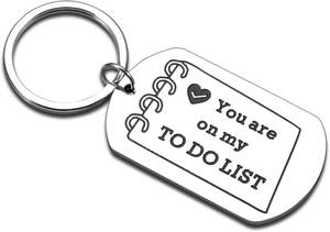 Detailed macro view of stainless steel keychain engraved with You are on my TO DO LIST