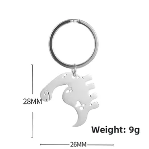 Detail view of cartoon dinosaur stainless steel keychain with heart cut-out dimensions