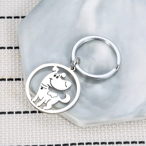 Porte-clés poli en acier inoxydable avec pendentif chien ajouré sur plateau en marbre