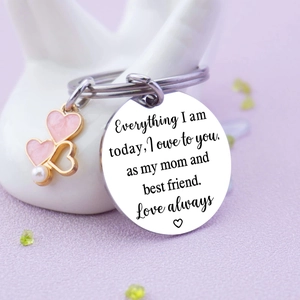 Love Always Mom stainless steel keychain with pink enamel hearts on hand display