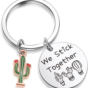 Polished stainless steel cactus keychain with We Stick Together engraved pendant