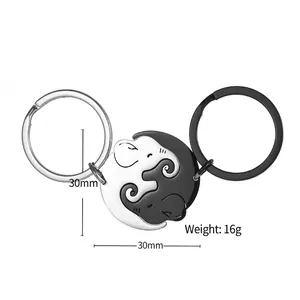 Cartoon elephant interlocking keychains in black and white finish for couples