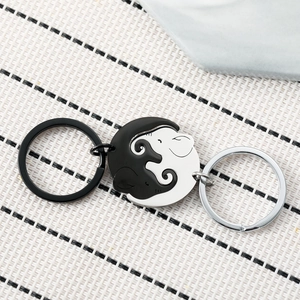 Cartoon elephant couple keychain set in black and silver stainless steel minimalist style