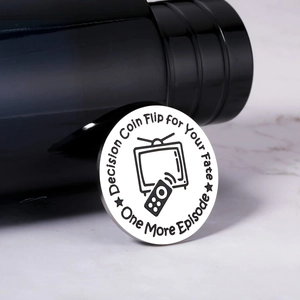Decision coin with engraved text and TV icon made of polished stainless steel metal