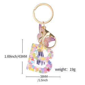 Porte-clés lettre B en résine avec paillettes violettes, pompon et fermoir doré