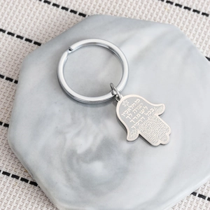 Silver stainless steel Hamsa hand keychain featuring Hebrew engraving and Star of David