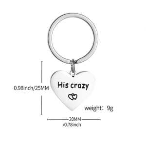 Detail of stainless steel heart keychain with 'His crazy' engraving and silver finish