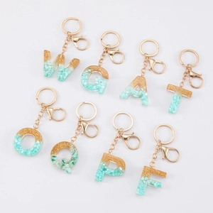 Resin initial keychain with gold leaf and mint green stones, set of alphabet pendants