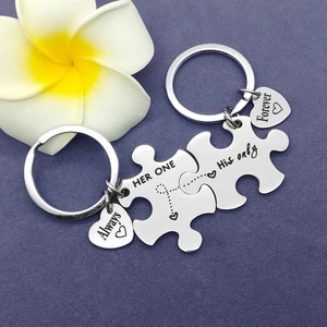 Polished stainless steel puzzle piece keychain set with always forever heart charms