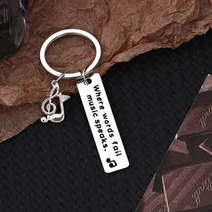 Polished stainless steel music keychain with treble clef and inspirational quote