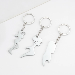 Three minimalist silver stainless steel female silhouette keychains and beer openers