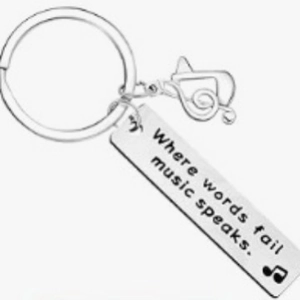 Musical stainless steel keychain with treble clef charm and inspirational music quote