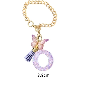 Purple resin letter O keychain with gold chain, glitter butterfly and tassel for Stanley cups