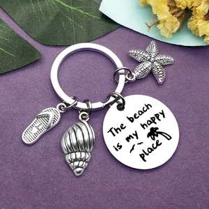 Silver stainless steel beach keychain with starfish, conch, and flip-flop charms