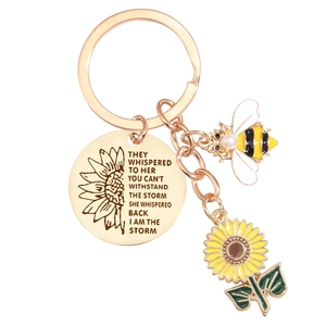 Golden stainless steel bee and sunflower keychain with inspirational round charm and pearl bead
