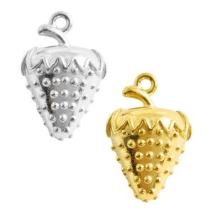 Macro detail of strawberry pendants in polished gold and silver finishes for DIY jewelry