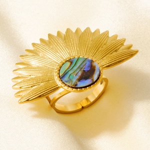 Detailed macro view of 18k gold plated fan-shaped ring with iridescent shell inlay