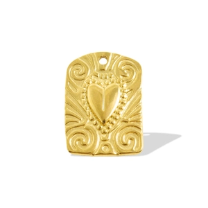 Detail of 18k gold heart pendant with ornate swirl patterns and beaded edges