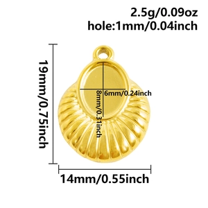 Macro detail of 18k gold plated fan-shaped pendant showing textured edges and oval center