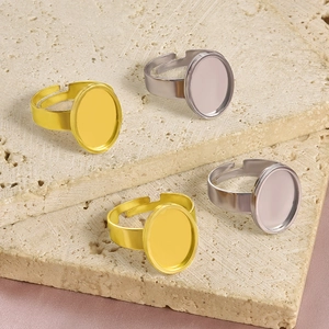 Detailed view of adjustable oval flat base ring settings in gold and silver plating