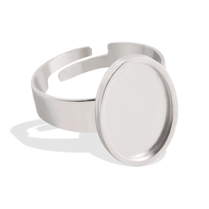 Detailed macro view of an adjustable stainless steel oval setting tray for DIY jewelry