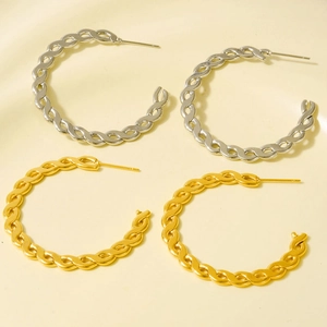 Twisted chain link hoop earrings in gold and silver finish with polished metallic luster