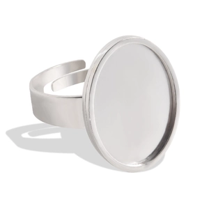 Close-up of adjustable stainless steel ring base with blank round bezel for DIY jewelry
