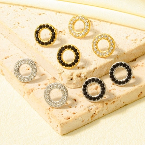 Minimalist circular hollow stud earrings with micro-paved cubic zirconia in gold and silver