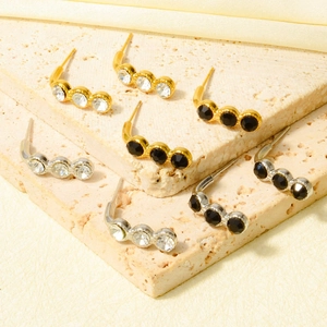 Minimalist 18k gold and silver curved bar stud earrings with sparkling zircon stones