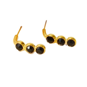 Minimalist 18k gold fringe stud earrings with three round black rhinestones on white background