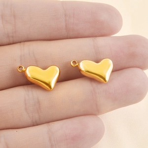 Pair of polished 304 stainless steel gold heart pendants for DIY jewelry making