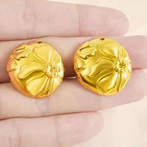 Detailed golden round floral embossed pendants for DIY necklaces and earrings
