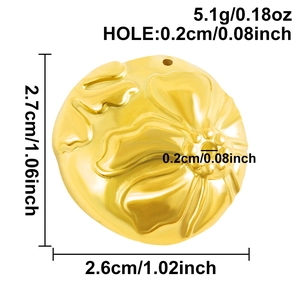 Macro detail of gold round floral embossed pendant showing 2.7cm size and 5.1g weight