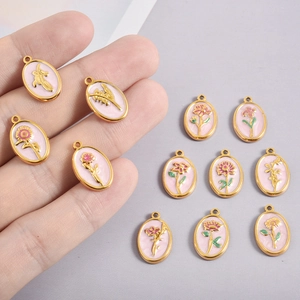 Pink enamel flower charms in oval gold stainless steel frames for DIY jewelry making