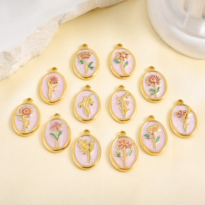 Set of 12 oval gold floral pendants with pink enamel for DIY jewelry making