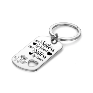 Silver stainless steel sisters keychain with heart cutout and engraved friendship quote